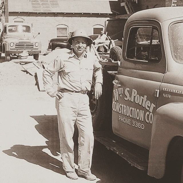 A Porter employee beside a Wm. S. Porter Construction Co. truck